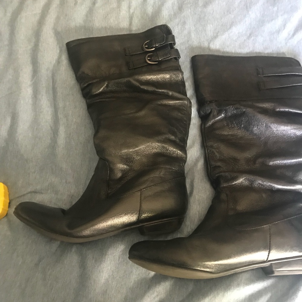 Black knee high Steve Madden boots